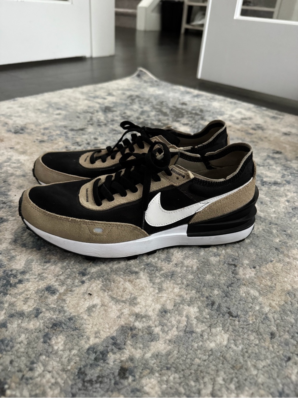 Nike Black and Tan Low-Top Sneakers with White Swoosh